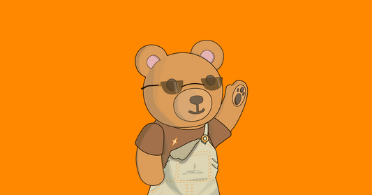 Benni the bear standing and waving wearing a brown tee with the Benni's Closet star logo, sunglasses, and blueish green overalls with one shoulder strap undone