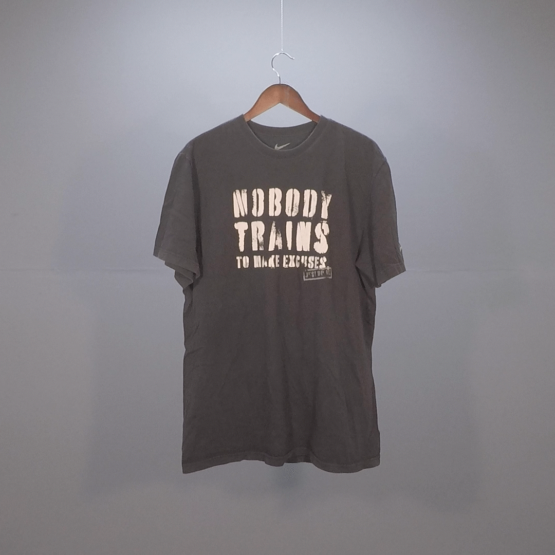 Nobody Trains to make Excuses Nike Graphic Tee